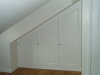 Cupboards built into eaves in loft conversion