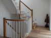 Oak staircase over 3 floors with painted white spindles
