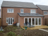 Rear kitchen extension with Bi-fold doors out onto decking.